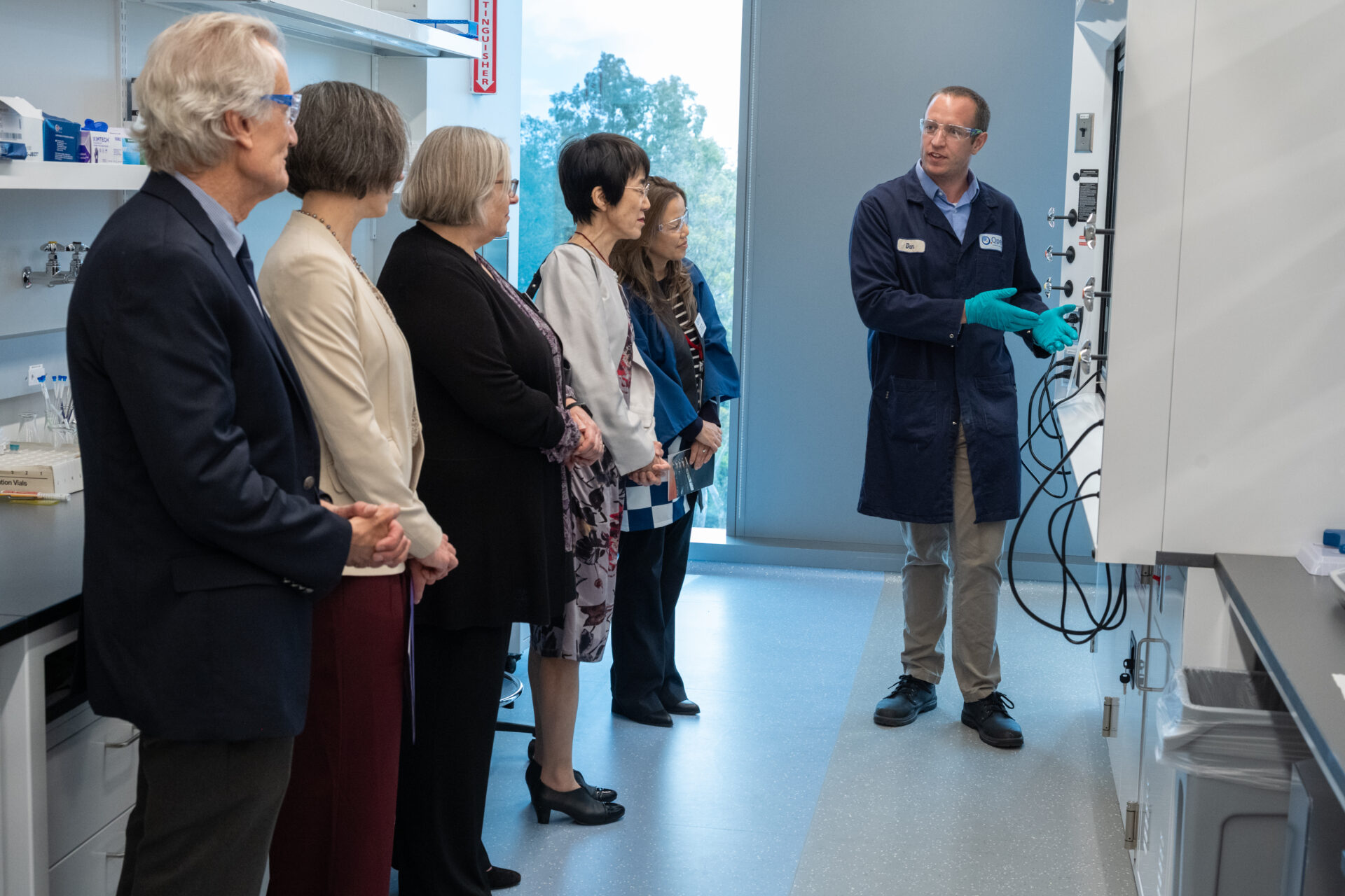 Visitors participating in a lab tour at the openning event.