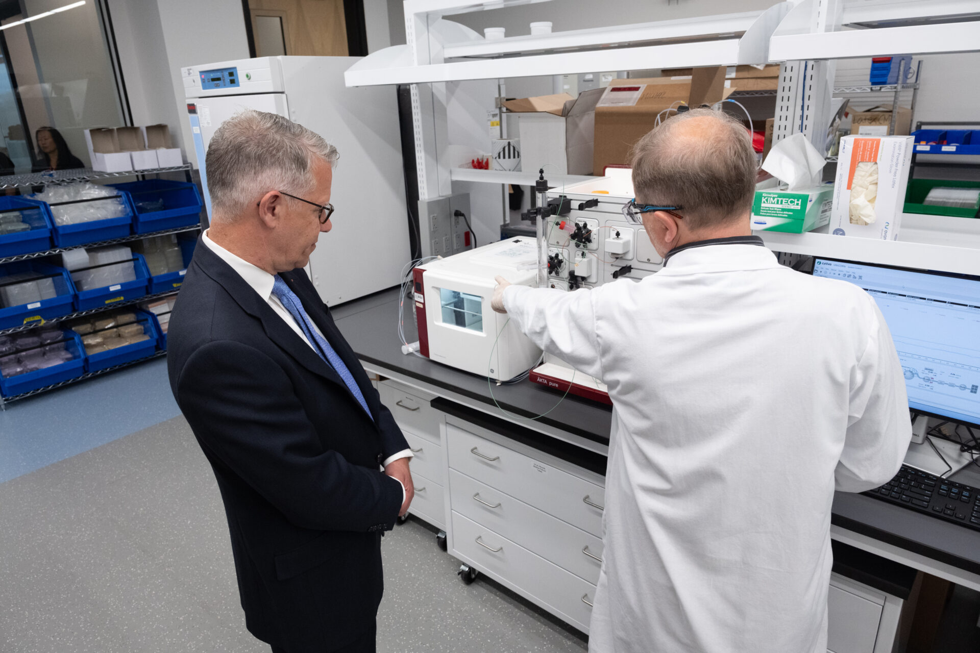Visitors participating in a lab tour at the openning event.