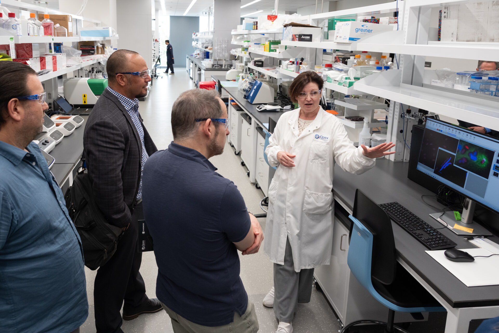 Visitors participating in a lab tour at the openning event.