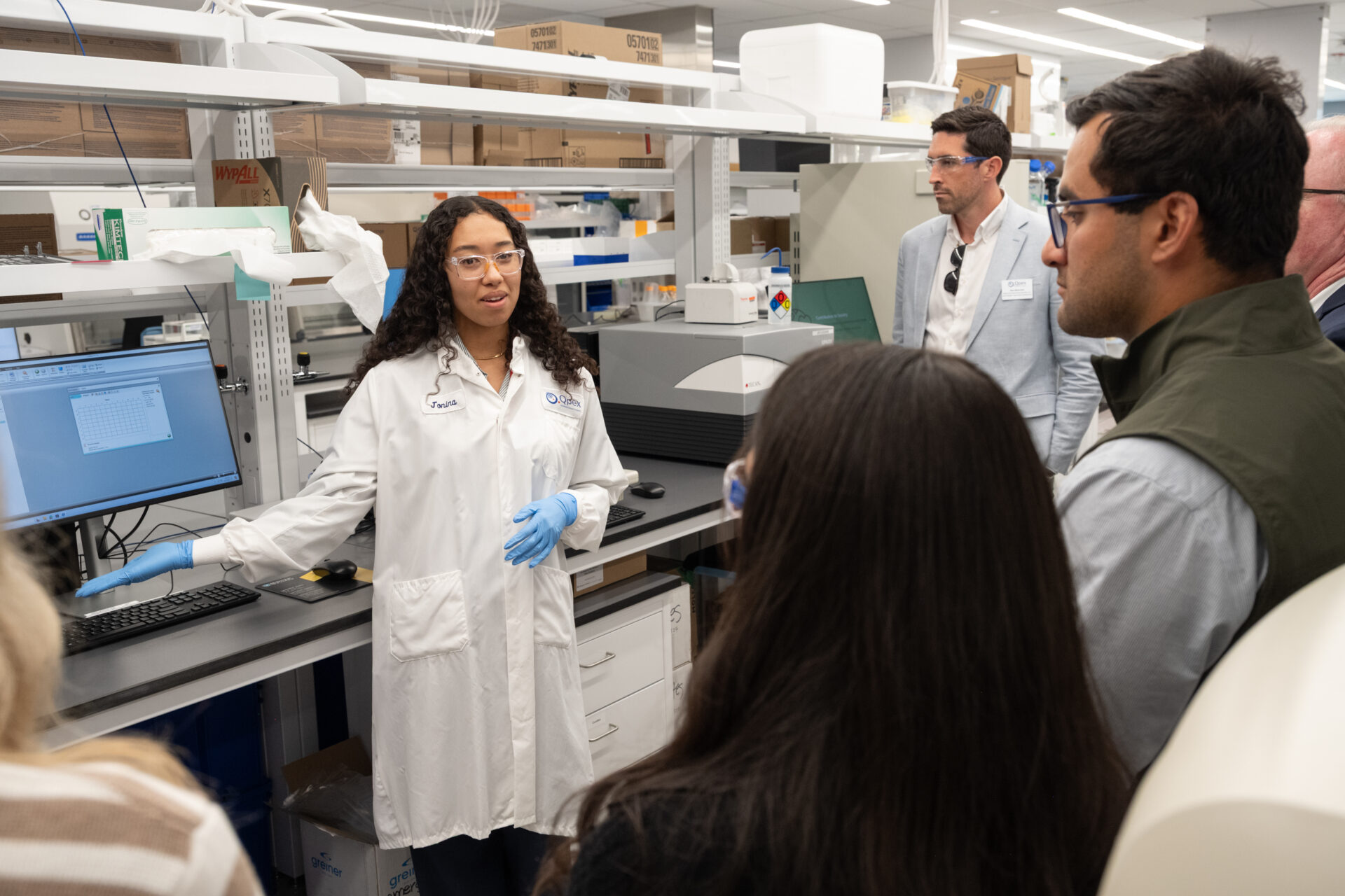 Visitors participating in a lab tour at the openning event.